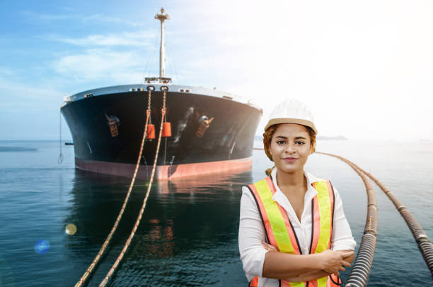 Photo of a woman in front of a ship