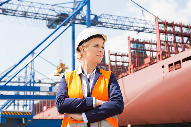 Photo of a woman next to a ship